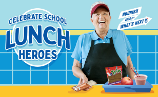 Celebrate school lunch heroes in dark blue text outlined in white over light blue circle. White female foodservice operator wearing maroon visor, light blue polo shirt and black apron standing at a yellow illustrated countertop. Blue cafeteria tray with yogurt parfait, apple, and Trix french toast in package. Operator holds mini cinnis in package. Background is illustrated light blue wall, medium blue tile with yellow border.