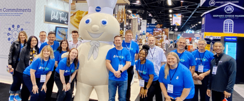 General Mills Foodservice staff at IDDBA 2023 with the Pillsbury Doughboy