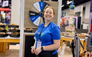 Staff member in front of IDDBA General Mills Foodservice booth