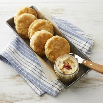 Pillsbury Freezer-to-Oven Cornbread Biscuits with seasoned butter ready to be served in a restaurant