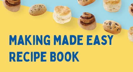 Making Made Easy Recipe Book. Cinnamon Rolls, Muffin Tops, and Biscuits lined up in a diagonal line on a yellow and light blue background.
