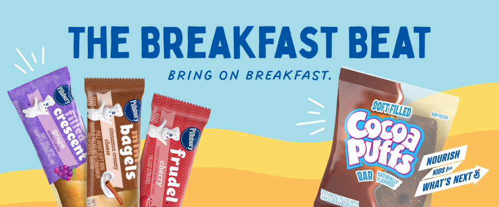 The breakfast beat, bring on breakfast written on light blue background with yellow waves striping behind an array of hot breakfast options. Grape, cinnamon creamy cheese, and cherry individually wrapped breakfast options fanned out next to a soft filled cocoa puffs bar.