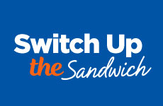 Text stating switch up the sandwich in white and orange on blue background.