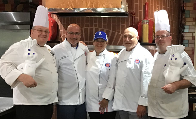 Pictured left to right: Virginia Tech Executive Chef Randall Van Dyke, Tom Santos, Shotsie Wilson, Michael Krygier, and Virginia Tech Pastry Chef Joshua Carroll.