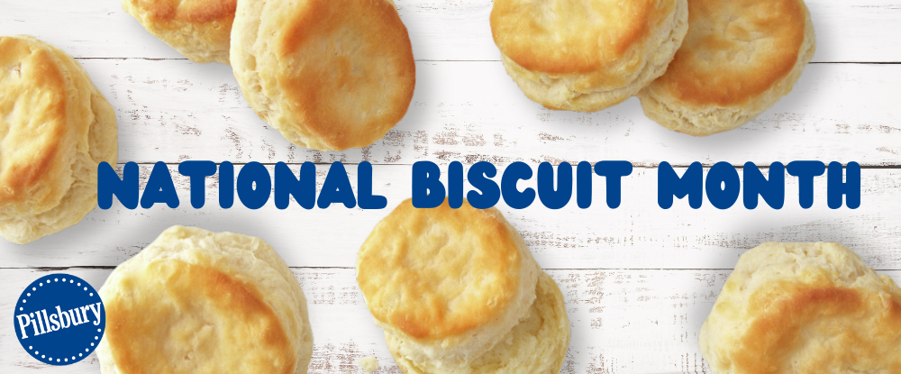 Scattered Pillsbury™ biscuits over a white wooden surface and “National Biscuit Month” text overlay