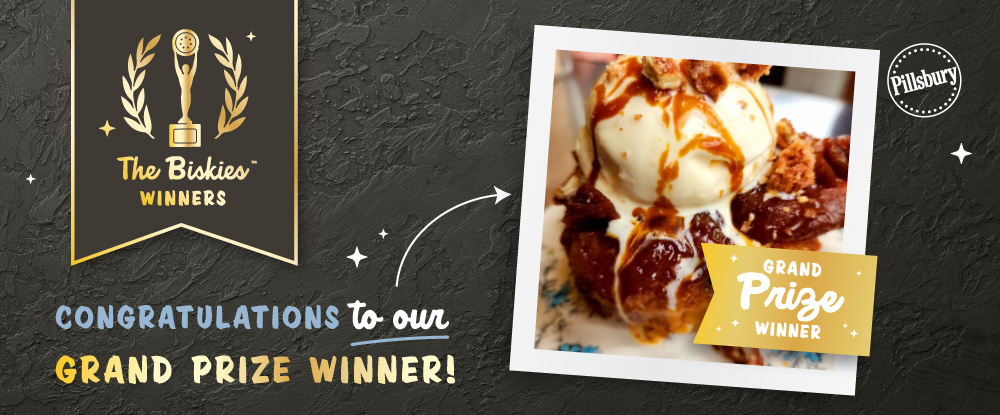 “Congratulations to our Grand Prize Winner” announcement under a black “The BiskiesTM Winners” banner in gold font. Image of a biscuit on a white plate topped with a scoop of ice cream drizzled in pecan praline.